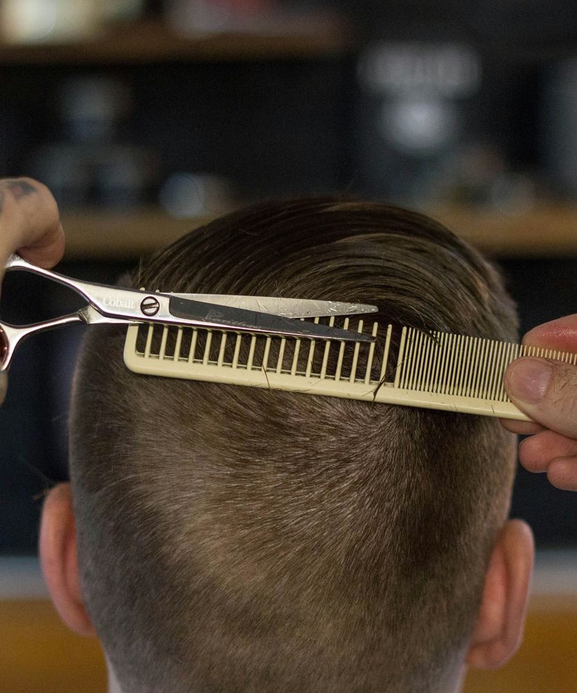 Teens bald fade at FlexCuts Barbershop